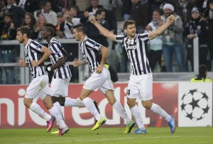 Juventus' Llorente celebrates after scoring against Real Madrid during their Champions League soccer match at Juventus stadium in Turin